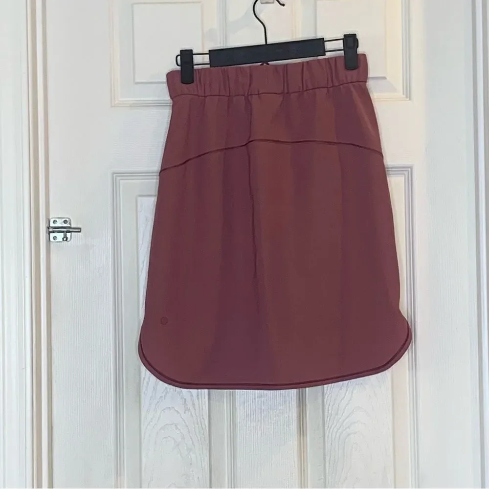 Lululemon on the fly skirt, color: cherry cola, size 4